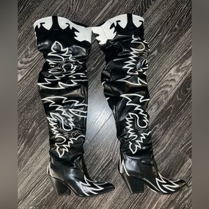 Thigh high cowboy boots